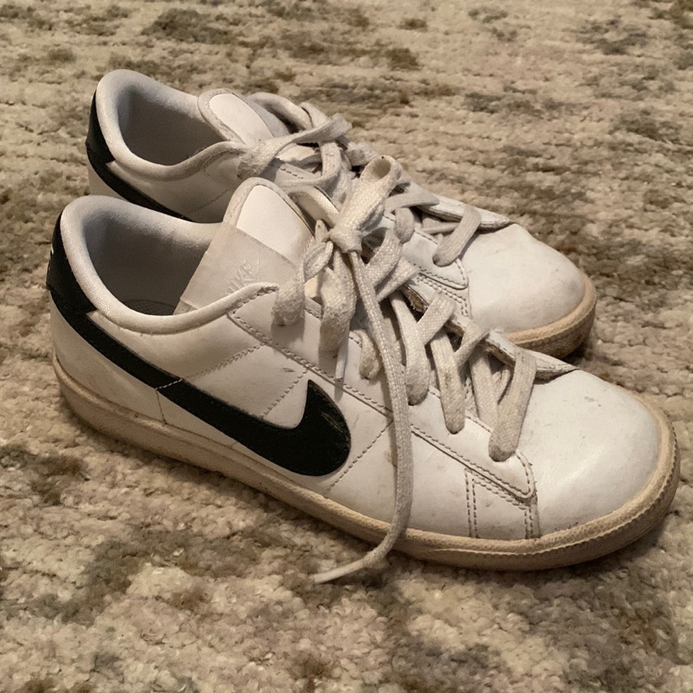 Well worn Nike tennis shoes